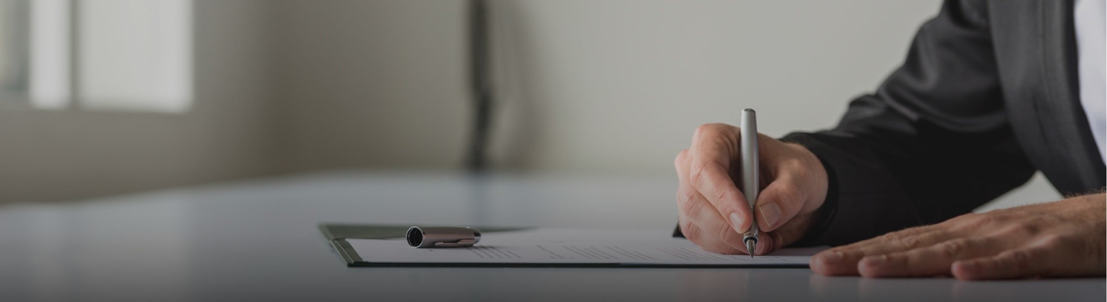 business man writing on form