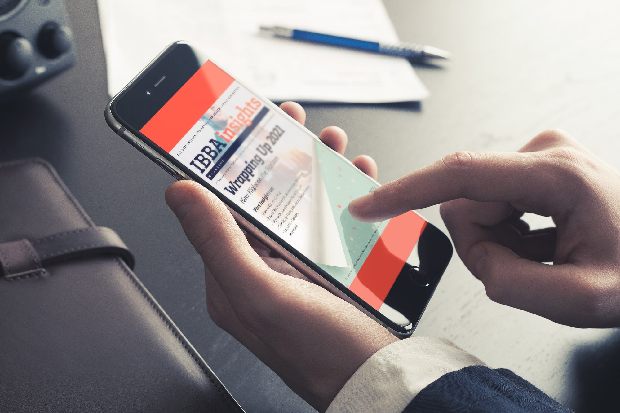 user reading ibba insights magazine winter 2021 edition on phone