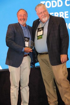 two award winners smiling for portrait