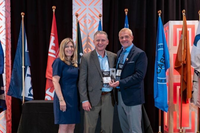 tomy pompeo poses with ibba board members