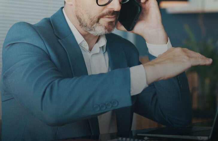 Businessman on the phone at his desk